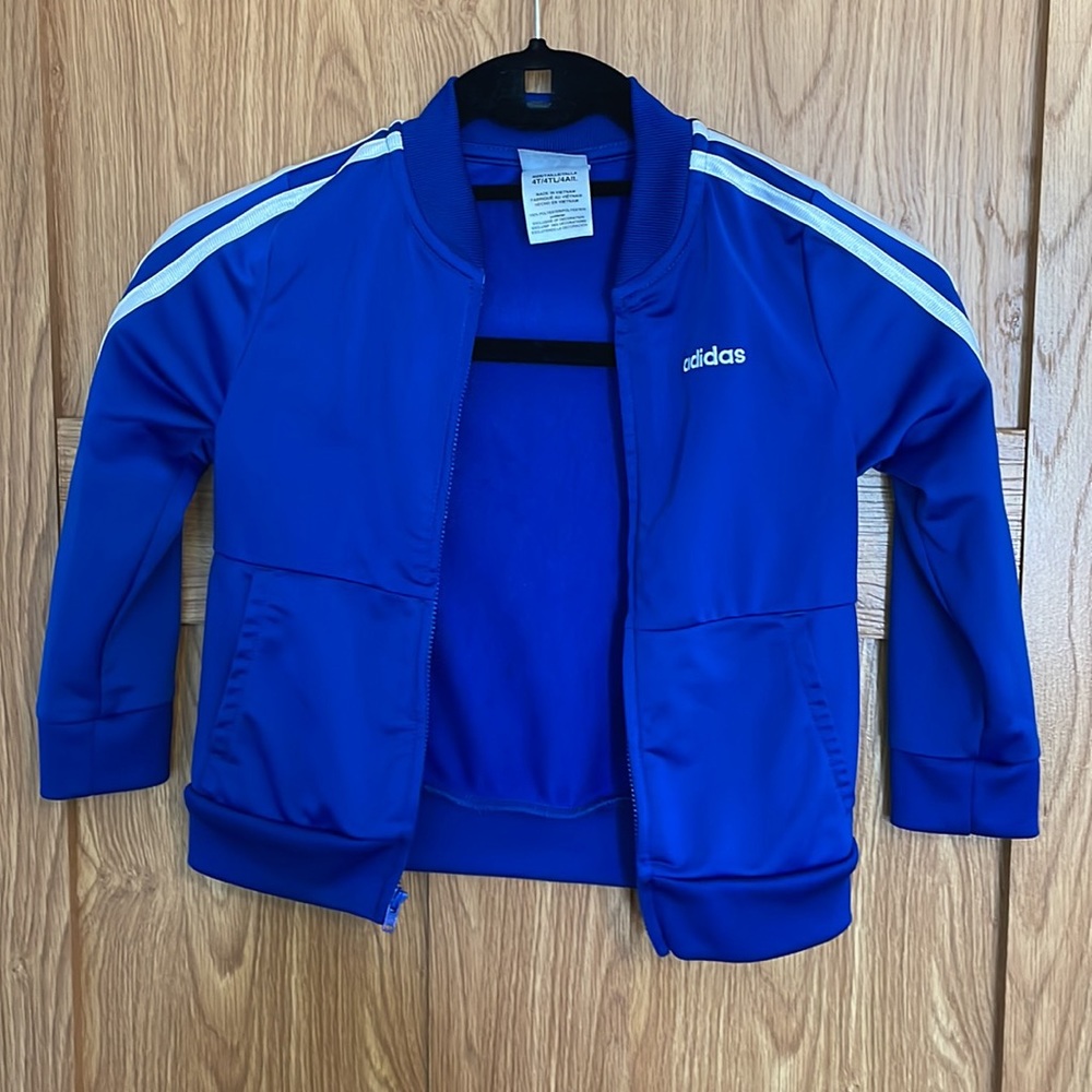 Adidas.Like new!  2-piece Barely worn.  This can be unisex!